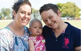 two mums with their baby