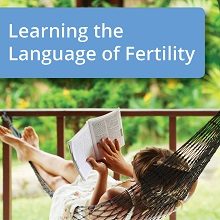 Woman reading book in hammock