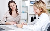 female doctor with female patient