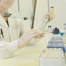 woman in the lab with test tube