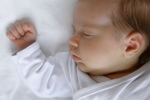 Baby sleeping with hat