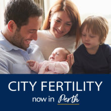 City Fertility now in Perth - Dad holding newborn baby next to his partner and son